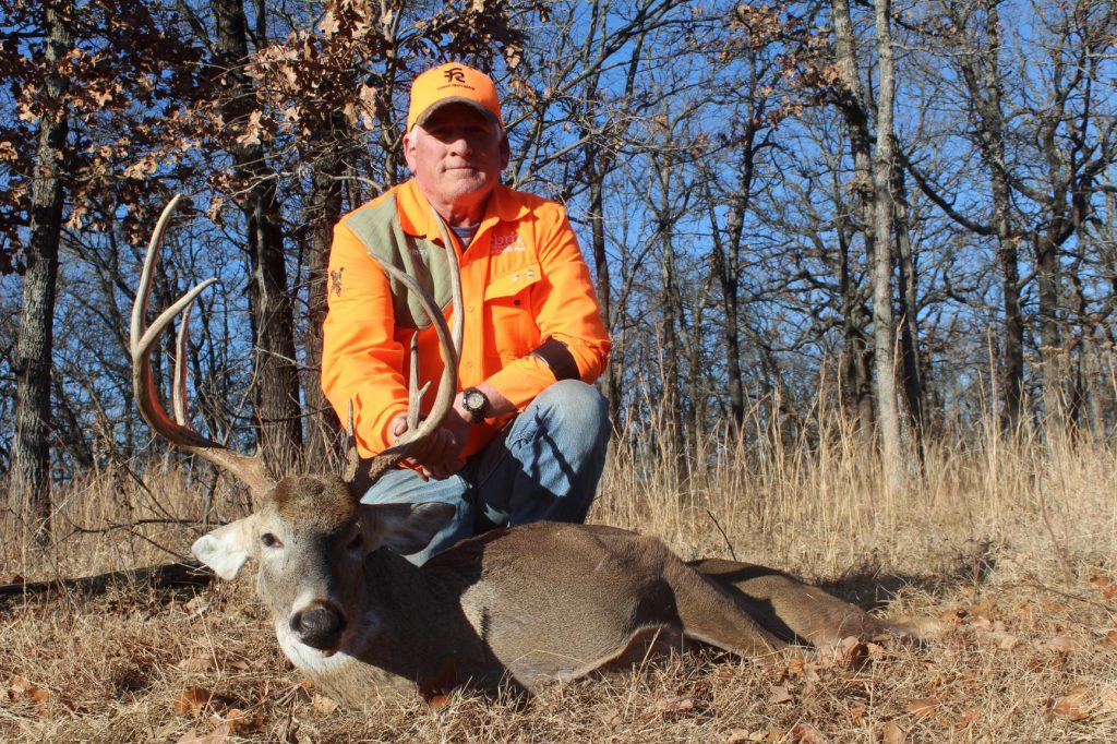 IMG_4100: Among our Kansas hunters and friends Bobby Dierks had the longest and perhaps toughest shot, a good buck headed over a ridge at something over 300 yards. Dierks used a .30-06, flat-shooting enough and plenty powerful.