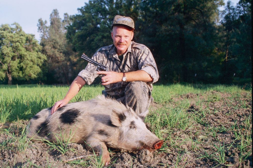 44 hog: This ugly hog was taken in a wild melee with dogs using a Smith & Wesson .44 Magnum. A big, open-sighted revolver is a great choice for hound hunting where shots are sure to be close, but not versatile enough in many situations.
