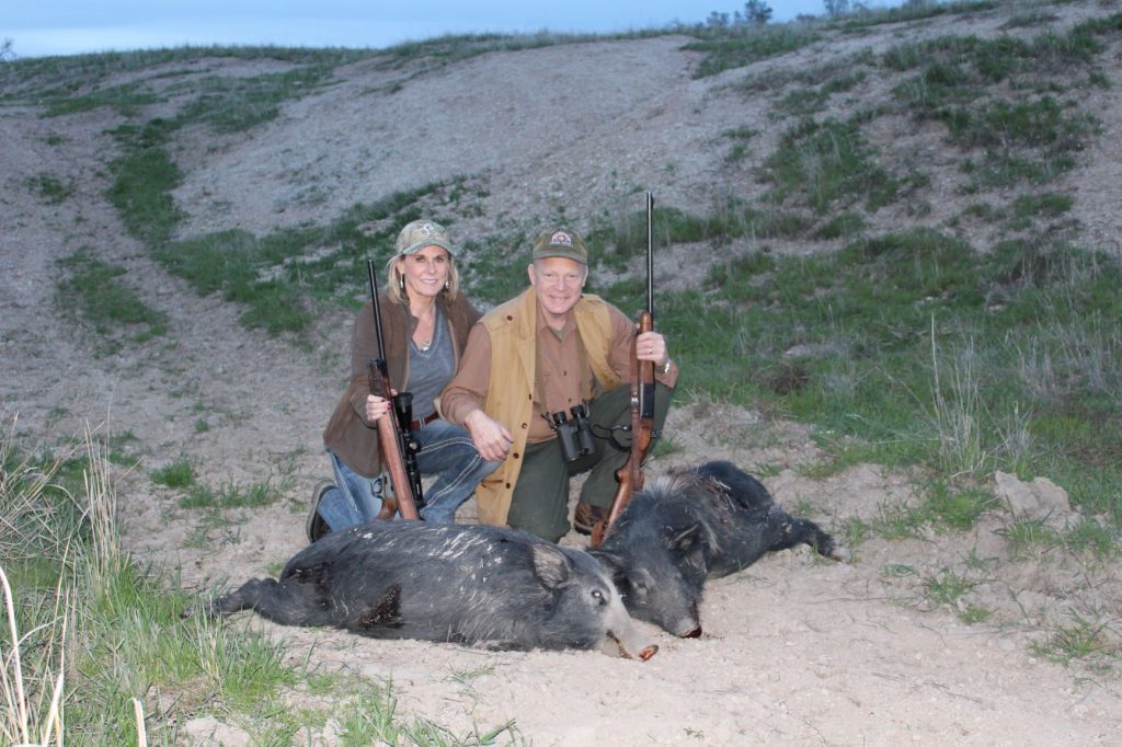 IMG_5981: Donna and Craig Boddington with a pair of California porkers. Donna used a scoped Blaser in .270 Winchester, always a good choice. Craig used a Savage 99 in .300 Savage. That’s a great and versatile old cartridge…but he accepted a bit of handicap with the rifle’s aperture sight.