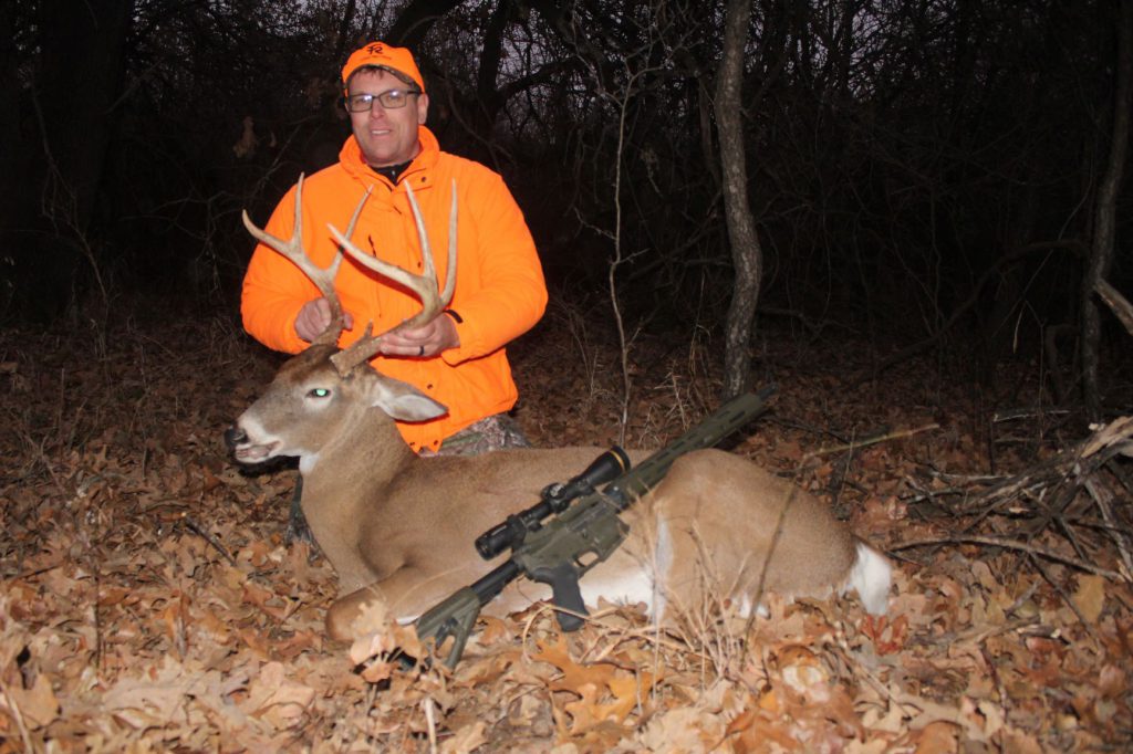 IMG_4286: Max Page with a nice Kansas buck, taken with an Alexander Arms 6.5mm Grendel, one shot at about 185 yards.