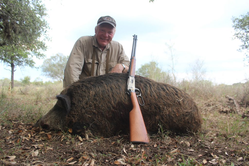A nice Texas hog taken with a Model 94 .30-30 with iron sights. Plenty of power at close range, but not much velocity and limited accuracy. How much accuracy, speed, and power are needed depends on what you’re hunting…and how far you intend to shoot.