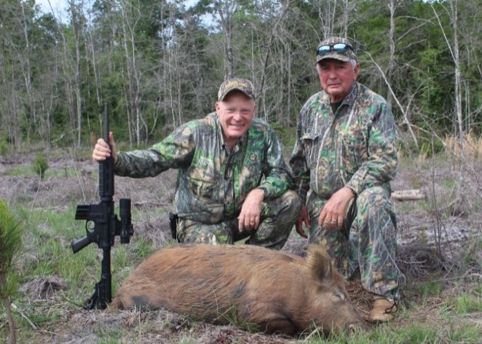 Boddington and his friend Zack Aultman with a Georgia hog