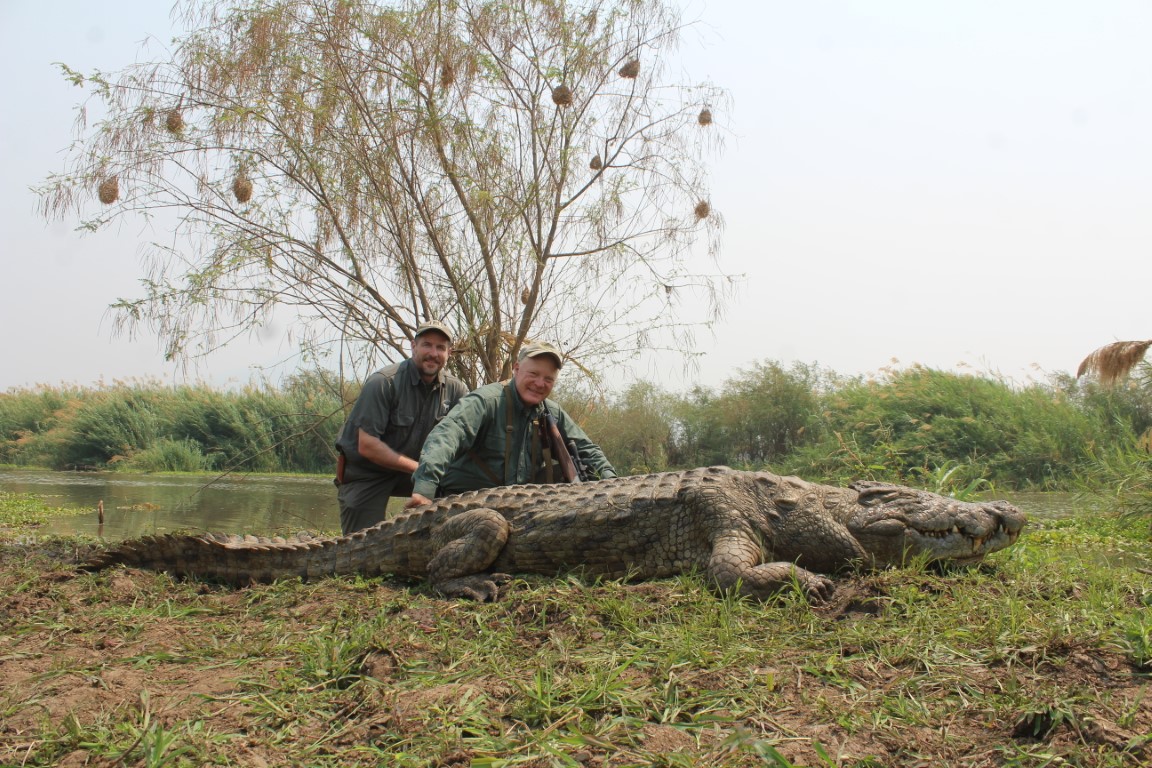 John Stucker and Boddington with Boddington’s Mozambique croc