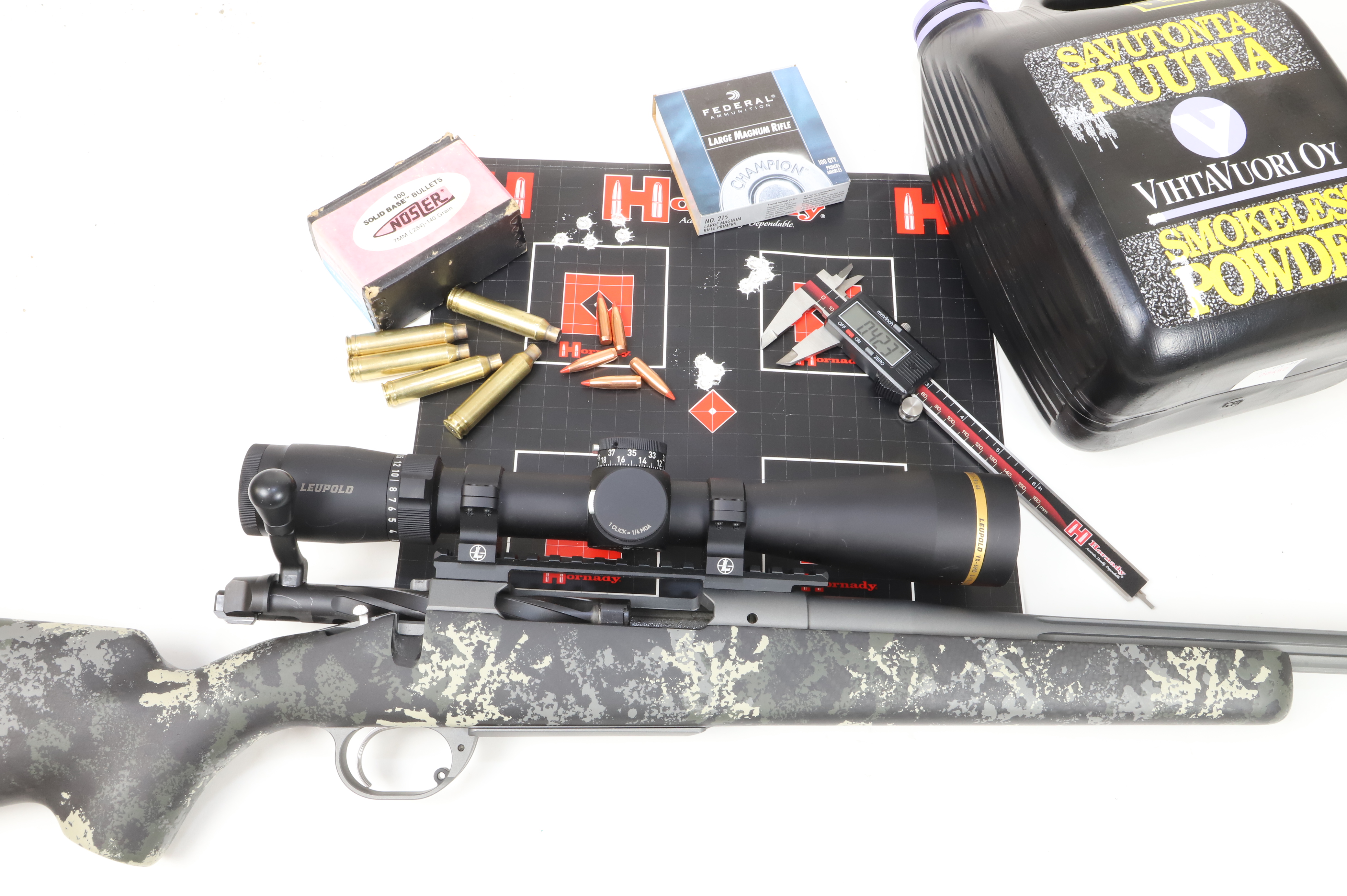 Don’t sell the 7 Rem Mag short. This Springfield Boundary in 7 Rem Mag responded wonderfully to a handload using Viht 160 powder with 140-grain Nosler Ballistic Tips. Center and top right are five-shot, 100-yard groups with this load.