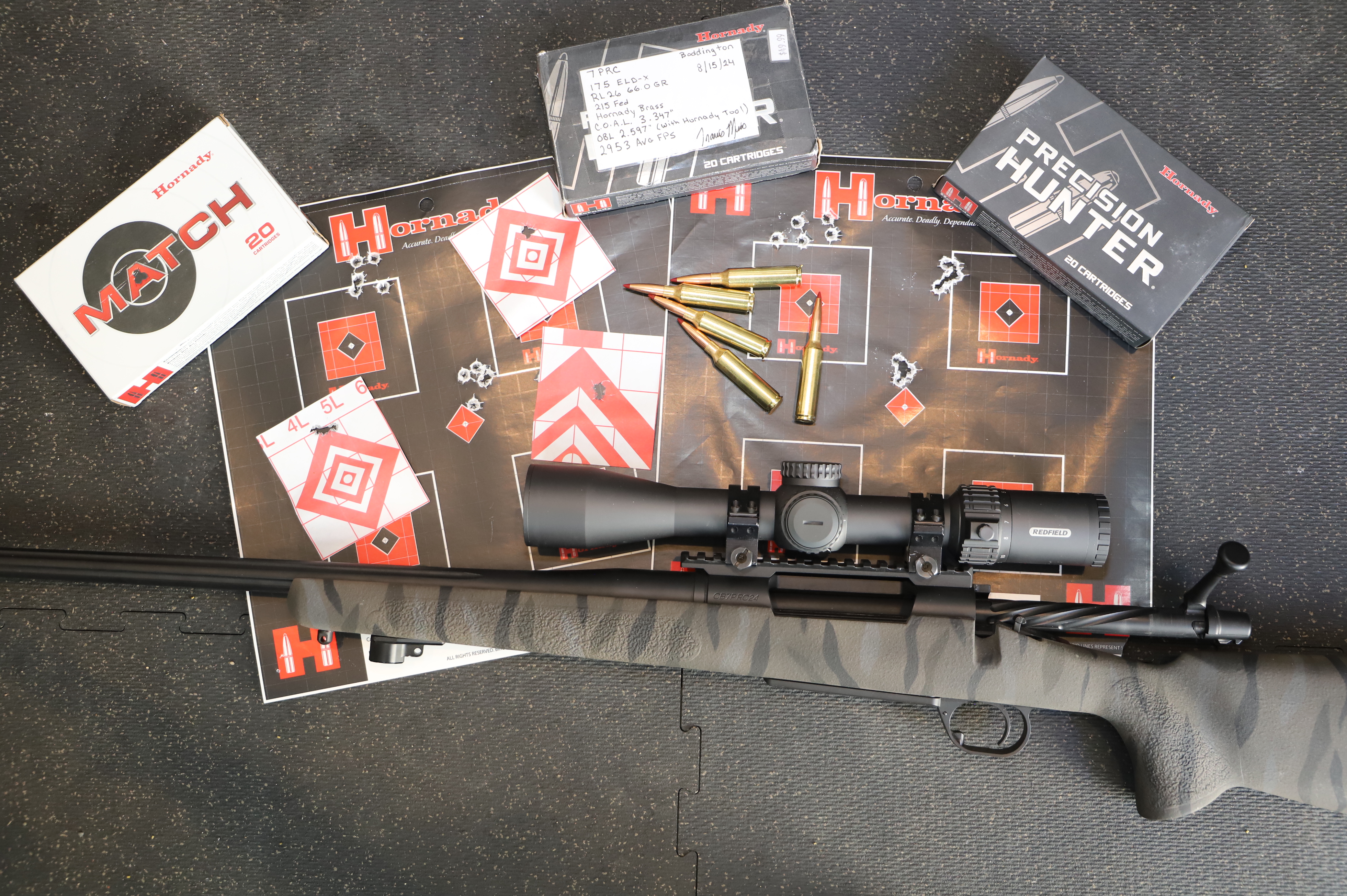 Boddington’s Flat Creek Precision 7 PRC came with some amazing test groups that he wasn’t sure he could live up to. Right center, and top right, with the right load, he’s getting there. These are five-shot groups; the cutout test targets are three-shot groups.